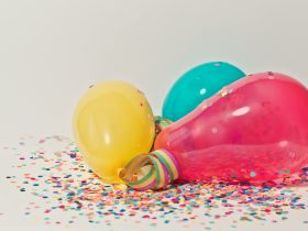 Yellow pink and blue party balloons