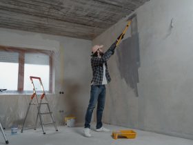 Man painting the wall