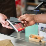 Person paying using a bank card